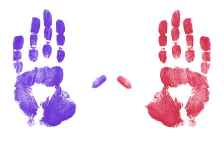 red and blue finger painted hand printsの写真素材