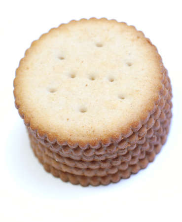 stack of round crackers on white backgroundの写真素材
