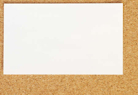 blank business card on cork board backgroundの写真素材