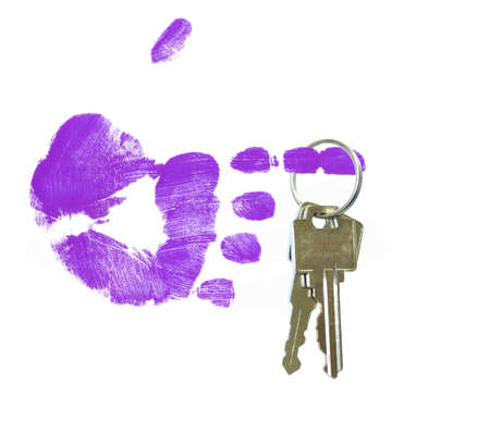 finger painted hand holding out set of keys