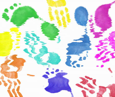 multi colored expressive hand and foot prints background の写真素材