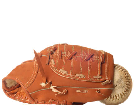 weathered baseball and baseball glove isolated on white backgroundの写真素材