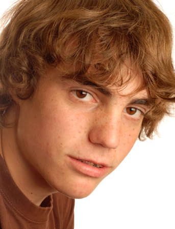 attractive fourteen year old boy with braces on his teethの写真素材