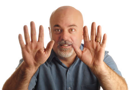 bald man holding up hands gesturing stop 