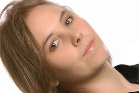 attractive teenage woman with a serious expression の写真素材