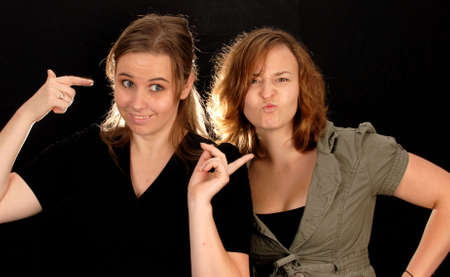 two girlfriends being silly with each other