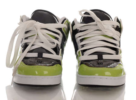 trendy style of skateboarding shoes with reflection on white backgroundの写真素材