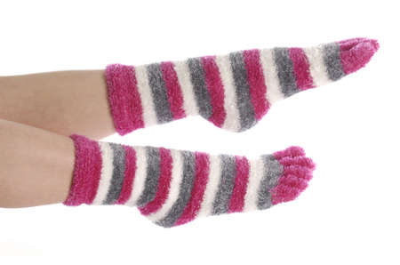 feet with pink toe socks isolated on white backgroundの写真素材