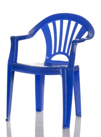 blue plastic child's chair with reflection on white backgroundの写真素材