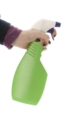 hand holding a bottle of spray cleaner isolated on white backgroundの写真素材