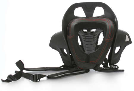 sport motocross neck brace with reflection on white backgroundの写真素材