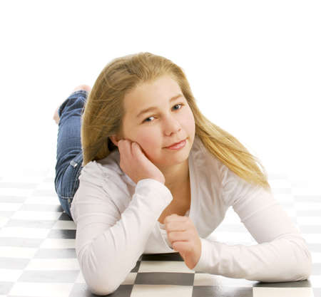 beautiful young teenage girl in casual clothing on white backgroundの写真素材