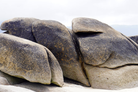 vacation destinations, large rocks on the beach.