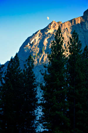 Half Dome is a granite dome at the eastern end of Yosemite Valley, possibly the Valley's most familiar sight. The granite crest rises more than 4,737 feet (1,440 m) above the Valley floorの写真素材