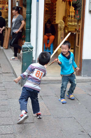 Old village by river in Shanghai with boatのeditorial素材