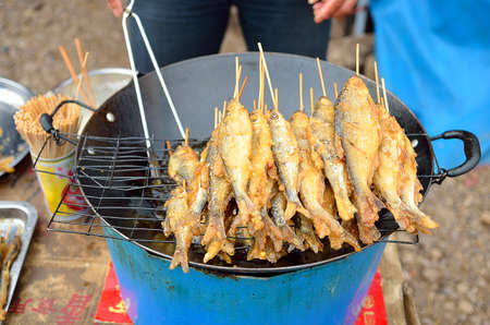 Stock image of a lot of fried fishの写真素材