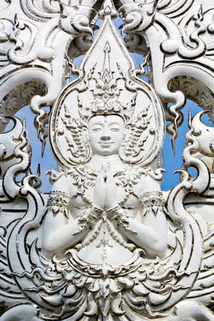Thai god is pressing the hands together at the chestの写真素材