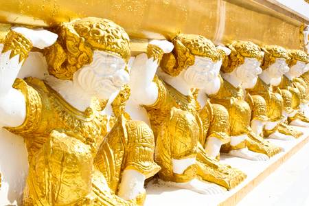 Row of great powerful monkeys carrying pagodaの写真素材