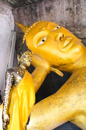 Sitting and reclining monksの写真素材