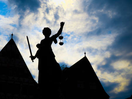 The shadow of god statue in the middle of villageの写真素材
