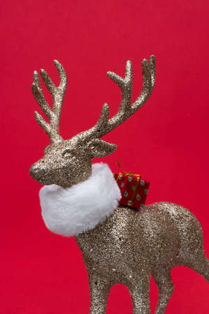 Golden deer on a red backgroundの写真素材