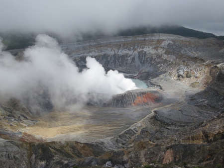 Smoking fumaroles of Poas volcano main craterの写真素材