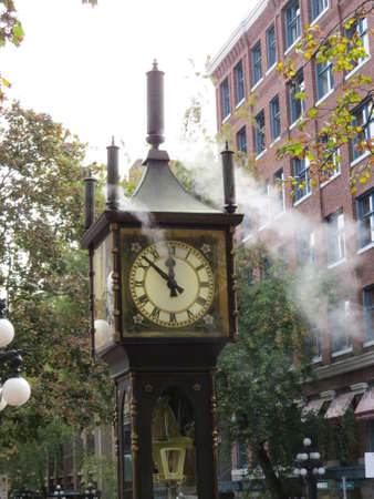 The steam clock, as its name implies runs on steam. It is located in Gastown in Vancouver, Canada and is a big tourist attraction.の写真素材