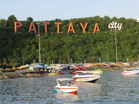 Pattaya City sign as seen from the boat pier in Pattaya bay, Thailand.のeditorial素材