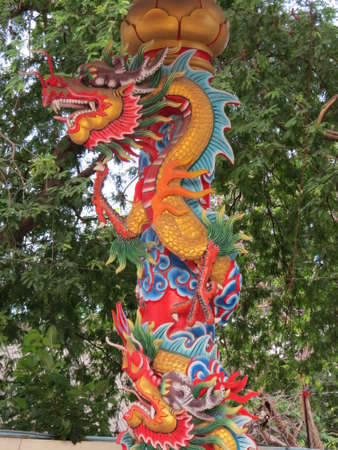 Dragon decoration on a column of a building in Thailand.の写真素材