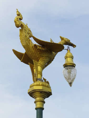 Ornamental lamp post in the grounds of a temple in Pattaya, Thailand.の写真素材