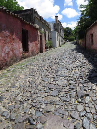 One of the old cobblestone streets in the Uruguayan town of Colonia de Sacramento.の写真素材