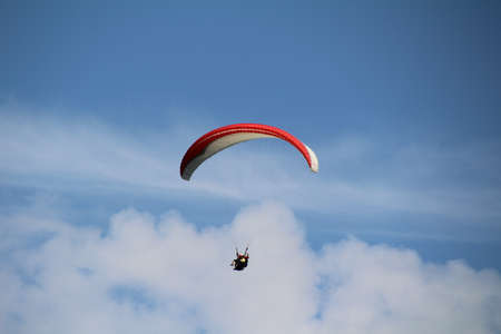 Hang glider in the blue skies above the Lake District.の写真素材