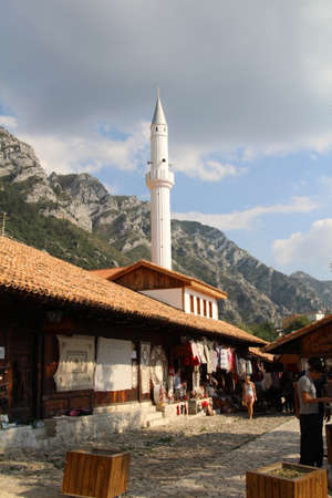 The old bazaar in Kruja, Albania consists of a cobbled street lined with shops, many selling souvenirs.のeditorial素材