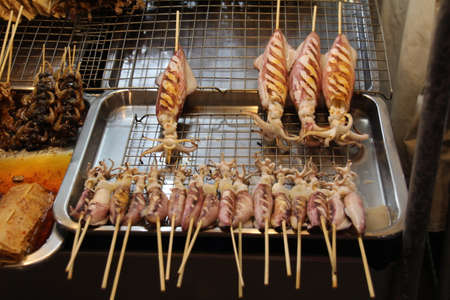 Fast food on display in Hau Hin night market, Thailand.の写真素材