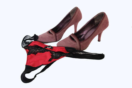 High heels and panties on a white background.の写真素材