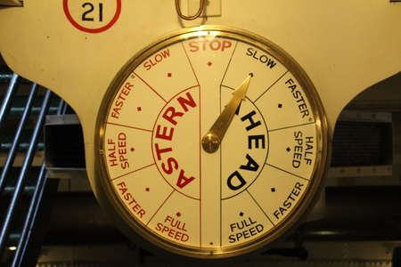 Ships telegraph in the engine room of an old steam powered warshipの写真素材