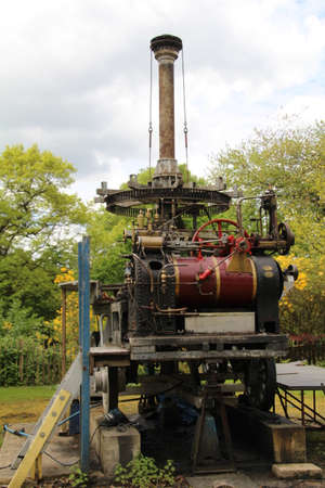 Old steam engine used to drive a fairground attraction. This one is awaiting restoration.