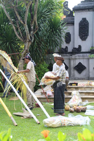 Bali, Indonesia - 31 May, 2018: Preparing for one of the many religious celebrations which take place on the Indonesian island of Bali. Each place of worship holds some sort of parade and due to the sheer number of churches, they seem to happen every day.のeditorial素材
