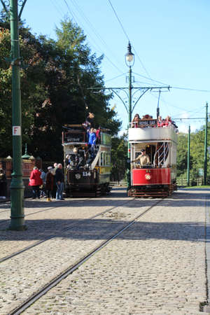 Newcastle, UK - 23 September, 2018: Old restored tram used to transport tourists around different areas of an open air museum.のeditorial素材