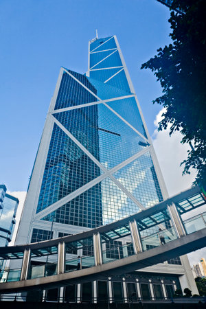 9 May 2006: Hong Kong - Bank of China building, in Hong Kong's CBD, with elevated walkways. Sky and other buildings reflected in glass.のeditorial素材