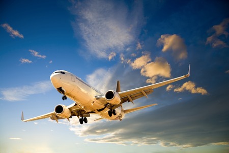 Commercial Jet Flying in Twilight Sky