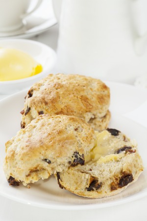 Date scones with butterの写真素材