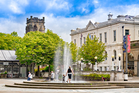 Southport Merseyside UK, Mother and Toddler Play in Fountain