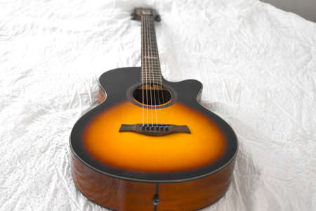 acoustic guitar on white background