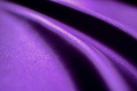 Purple satin fabric as background, closeup. Space for textの写真素材