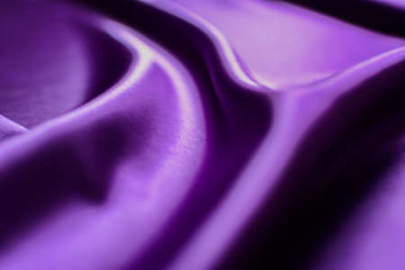 Purple satin background. Close-up of purple satin fabric textureの写真素材