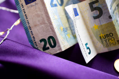 Euro banknotes on a purple background close-up. Business conceptの写真素材