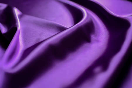 Purple satin fabric as background, closeup. Space for textの写真素材