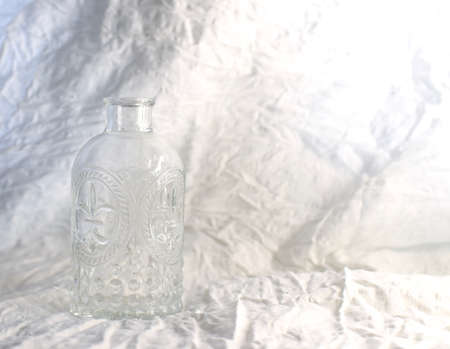 Vintage glass bottle on white background. Copy space for text.の写真素材