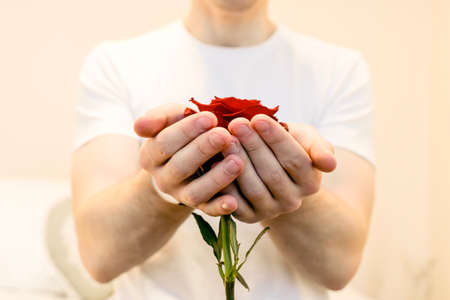 Young man organizing the romantic date for his girlfriend. High quality photoの写真素材